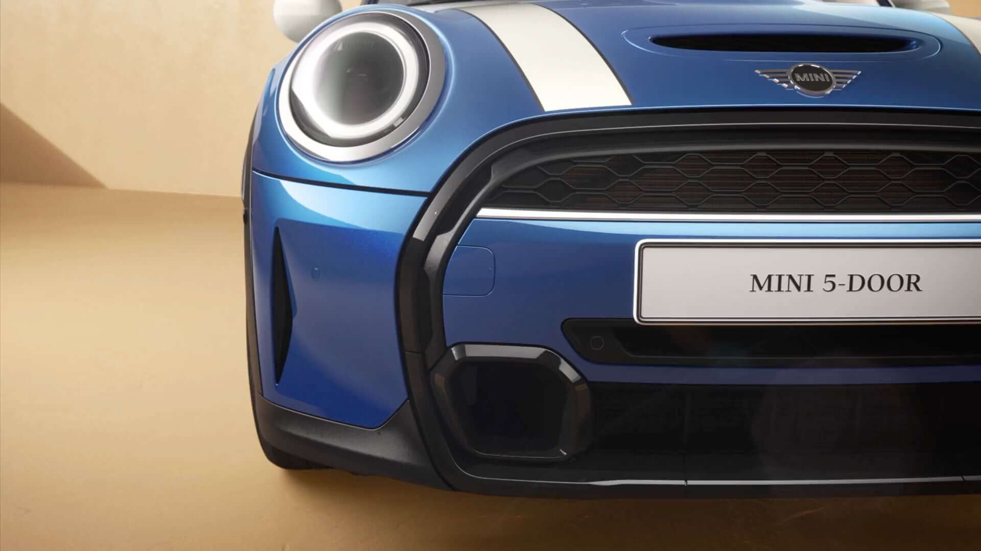 MINI Hatch 5 Portas - visão frontal - azul e branco